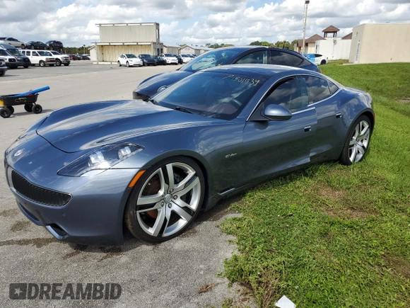 2012 Fisker Karma EcoSport z VIN YH4K14AA3CA001524, wystawiony jako Copart lot #74501534 z przebiegiem 15 969 mil mil oraz Nie do naprawy. Historia ofert i sprzedaży dostępna na DreamBid. Obrazek 1.