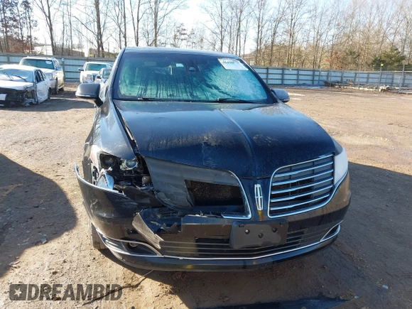 2018 Lincoln MKT with VIN 2LMHJ5NK5JBL02245, listed as a IAAI auction lot 41430571 with 293,537 mi miles and . Bid and sale history available at carsss.com. Image 12.