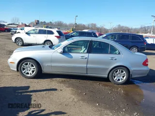 2006 Mercedes-Benz E-Class 3.5L with VIN WDBUF56J06A737827, listed as a IAAI auction lot 41748739 with 197,843 mi miles. Bid and sale history available at carsss.com. Image 14.