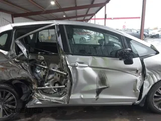 2015 Honda Fit EX-L with VIN 3HGGK5H82FM702649, listed as a IAAI auction lot 40931610 with 55,441 mi miles. Bid and sale history available at carsss.com. Image 14.