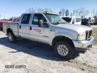 2000 Ford F-350 XL with VIN 1FTSW31F2YED14050, listed as a Copart auction lot 45839055 with 302,831 mi miles and Non Repairable. Bid and sale history available at DreamBid. Image 4.
