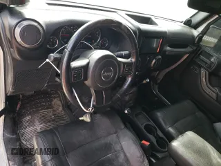 2011 Jeep Wrangler Sport with VIN 1J4GA2D15BL592081, listed as a Copart auction lot 42992345 with 139,364 mi miles and Salvage Title. Bid and sale history available at carsss.com. Image 8.