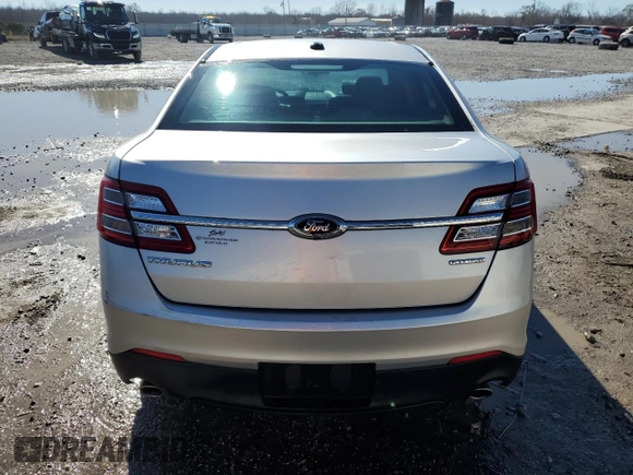 2015 Ford Taurus SE with VIN 1FAHP2D84FG149799, listed as a Copart auction lot 88993345 with 114,131 mi miles and Salvage Title. Bid and sale history available at DreamBid. Image 6.