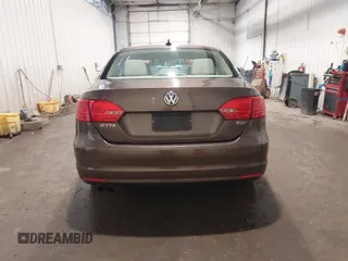 2014 Volkswagen Jetta TDI w/Premium with VIN 3VWLL7AJ1EM358214, listed as a IAAI auction lot 42148435 with 174,923 mi miles and . Bid and sale history available at DreamBid. Image 17.