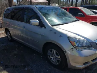 2005 Honda Odyssey EX-L with VIN 5FNRL38795B115738, listed as a IAAI auction lot 41789669 with 292,926 mi miles. Bid and sale history available at carsss.com. Image 1.