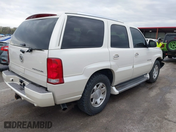 2005 Cadillac Escalade z VIN 1GYEK63N25R190908, wystawiony jako IAAI lot #41882135 z przebiegiem 243 333 mil mil oraz . Historia ofert i sprzedaży dostępna na DreamBid. Obrazek 4.