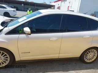 2013 Ford C-Max SE z VIN 1FADP5AU1DL518916, wystawiony jako IAAI lot #42452252 z przebiegiem 250 862 mil mil oraz . Historia ofert i sprzedaży dostępna na DreamBid. Obrazek 15.