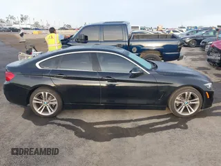2019 BMW 4 Series 430i with VIN WBA4J1C53KBM17029, listed as a IAAI auction lot 41933607 with 54,107 mi miles and . Bid and sale history available at DreamBid. Image 14.