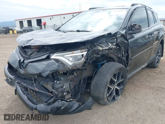 2018 Toyota RAV4 SE with VIN 2T3JFREV1JW730203, listed as a IAAI auction lot 42504455 with 99,442 mi miles and . Bid and sale history available at DreamBid. Image 6.
