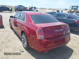 2014 Chrysler 300 with VIN 2C3CCABT2EH157487, listed as a IAAI auction lot 40127984 with 82,957 mi miles. Bid and sale history available at carsss.com. Image 3.