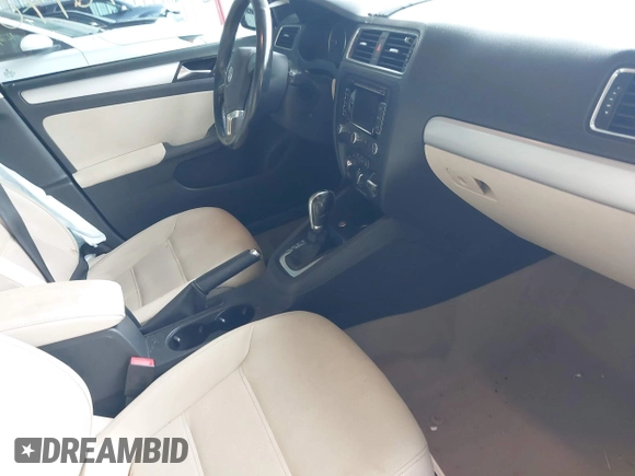 2012 Volkswagen Jetta TDI w/Premium & Nav with VIN 3VWLL7AJ8CM326549, listed as a IAAI auction lot 42748170 with 200,385 mi miles and . Bid and sale history available at DreamBid. Image 5.