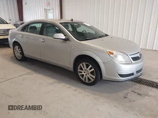 2009 Saturn Aura XR z VIN 1G8ZV57B69F183227, wystawiony jako IAAI lot #42335650 z przebiegiem 184 762 mil mil oraz . Historia ofert i sprzedaży dostępna na DreamBid. Obrazek 1.