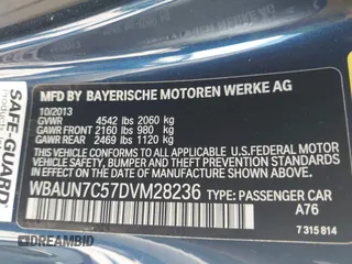 2013 BMW 1 Series 135i with VIN WBAUN7C57DVM28236, listed as a IAAI auction lot 41900116 with 38,876 mi miles and . Bid and sale history available at carsss.com. Image 9.