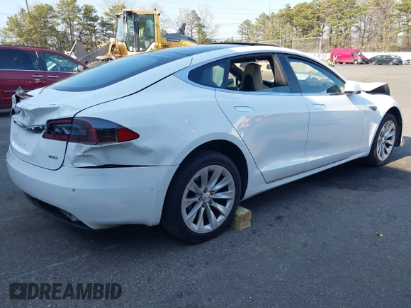 2016 Tesla Model S 90D with VIN 5YJSA1E26GF147327, listed as a IAAI auction lot 42077766 with 89,502 mi miles and . Bid and sale history available at DreamBid. Image 4.