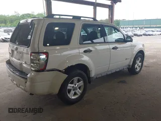 2009 Ford Escape Hybrid with VIN 1FMCU59399KC34999, listed as a IAAI auction lot 42515815 with 201,130 mi miles and . Bid and sale history available at DreamBid. Image 4.