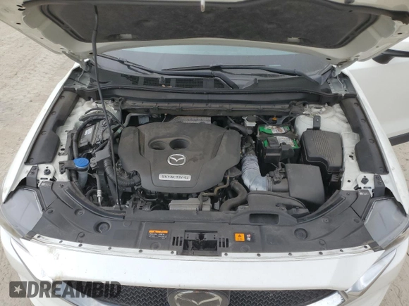 2021 Mazda CX-5 Grand Touring Reserve with VIN JM3KFBAY5M0320404, listed as a Copart auction lot 50405075 with 32,596 mi miles and Salvage Title. Bid and sale history available at carsss.com. Image 13.