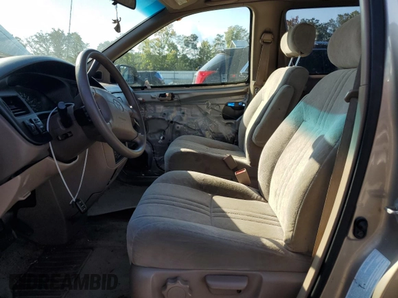 2000 Toyota Sienna LE with VIN 4T3ZF13C4YU304036, listed as a Copart auction lot 72448274 with 176,388 mi miles and Salvage Title. Bid and sale history available at carsss.com. Image 7.
