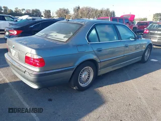 2001 BMW 7 Series 740iL with VIN WBAGH83491DP25818, listed as a IAAI auction lot 41827907 with 125,670 mi miles. Bid and sale history available at carsss.com. Image 4.