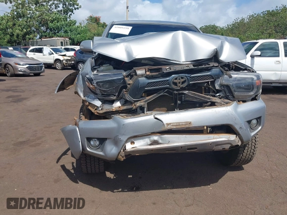 2014 Toyota Tacoma with VIN 3TMLU4EN3EM159080, listed as a IAAI auction lot 41809259 with 113,950 mi miles and . Bid and sale history available at DreamBid. Image 6.