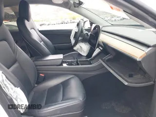 2020 Tesla Model Y Long Range with VIN 5YJYGDEE2LF022484, listed as a IAAI auction lot 41798662 with 108,978 mi miles and . Bid and sale history available at DreamBid. Image 5.