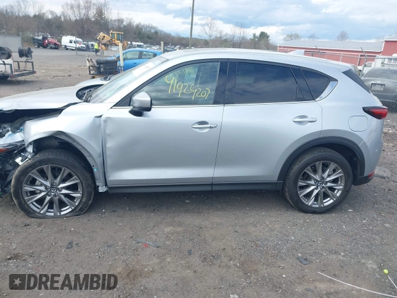 2021 Mazda CX-5 Grand Touring with VIN JM3KFBDM3M0354348, listed as a IAAI auction lot 41924207 with 45,786 mi miles. Bid and sale history available at carsss.com. Image 14.