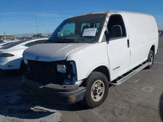 2005 GMC Savana Cargo Van with VIN 1GTGG25V951900357, listed as a IAAI auction lot 41316978 with 102,732 mi miles. Bid and sale history available at carsss.com. Image 2.