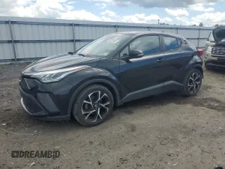 2022 Toyota C-HR XLE z VIN NMTKHMBX8NR141470, wystawiony jako Copart lot #55233465 z przebiegiem 35 900 mil mil oraz Szkoda całkowita • Salvage title. Historia ofert i sprzedaży dostępna na DreamBid. Obrazek 1.