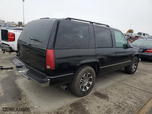 1997 Chevrolet Tahoe with VIN 1GNEC13R3VJ406120, listed as a Copart auction lot 81569674 with 203,863 mi miles and Salvage Title. Bid and sale history available at carsss.com. Image 3.