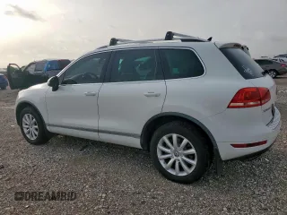2012 Volkswagen Touareg Sport z VIN WVGEF9BP4CD007058, wystawiony jako Copart lot #56971745 z przebiegiem 181 221 mil mil oraz Czysty tytuł • Clean title. Historia ofert i sprzedaży dostępna na DreamBid. Obrazek 2.