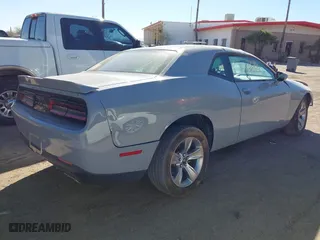 2021 Dodge Challenger SXT with VIN 2C3CDZAG5MH534621, listed as a IAAI auction lot 41667234 with 78,947 mi miles. Bid and sale history available at carsss.com. Image 4.