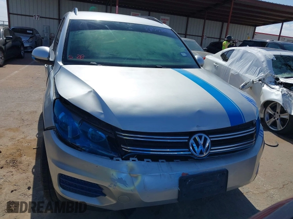 2016 Volkswagen Tiguan S with VIN WVGAV7AX9GW567790, listed as a IAAI auction lot 42352288 with 119,526 mi miles and . Bid and sale history available at DreamBid. Image 12.