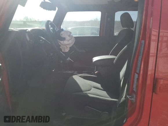 2015 Jeep Wrangler Unlimited Willys Wheeler with VIN 1C4BJWDG8FL574014, listed as a Copart auction lot 51921255 with 54,134 mi miles and Salvage Title. Bid and sale history available at DreamBid. Image 7.