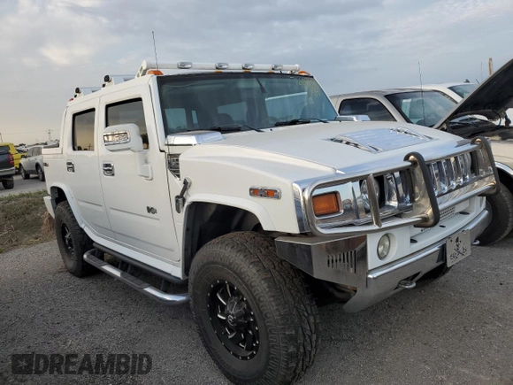 2006 Hummer H2 with VIN 5GRGN22U56H105928, listed as a Copart auction lot 76692904 with 0 mi miles and Salvage Title. Bid and sale history available at carsss.com. Image 4.