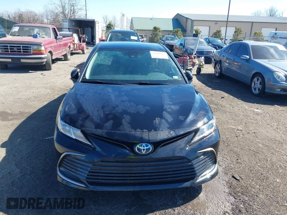 2021 Toyota Camry Hybrid LE with VIN 4T1C31AK4MU553612, listed as a IAAI auction lot 41609111 with 34,399 mi miles. Bid and sale history available at carsss.com. Image 13.