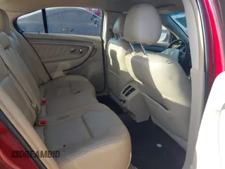 2014 Ford Taurus SEL with VIN 1FAHP2E80EG159131, listed as a IAAI auction lot 42004296 with 140,213 mi miles and . Bid and sale history available at DreamBid. Image 8.