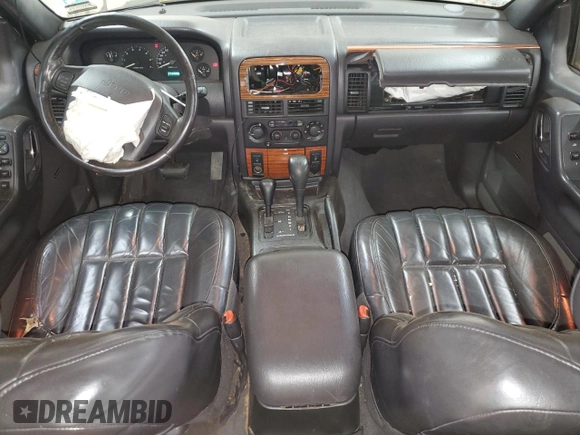1999 Jeep Grand Cherokee Limited с VIN 1J4GW68S8XC627893, выставлен на аукционе Copart как лот 53284365 с пробегом 233 996 миль миль и Списание • Salvage title. История ставок и продаж доступна на DreamBid. Изображение 8.