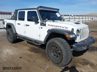 2021 Jeep Gladiator Mojave with VIN 1C6JJTEG2ML578573, listed as a IAAI auction lot 42034265 with 30,141 mi miles. Bid and sale history available at carsss.com. Image 1.
