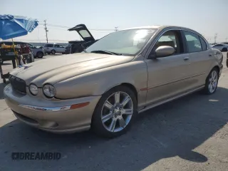 2003 Jaguar X-Type 3.0L z VIN SAJEA51CX3WD17198, wystawiony jako Copart lot #60332485 z przebiegiem Nie podano mil oraz Czysty tytuł • Clean title. Historia ofert i sprzedaży dostępna na DreamBid. Obrazek 1.