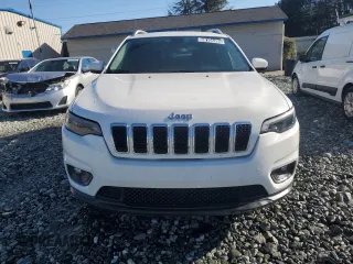 2019 Jeep Cherokee Latitude with VIN 1C4PJMCX0KD125555, listed as a Copart auction lot 48104495 with 115,138 mi miles and Clean Title. Bid and sale history available at carsss.com. Image 5.
