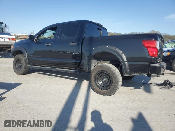 2018 Nissan Titan SV with VIN 1N6AA1E57JN545173, listed as a Copart auction lot 51579155 with 165,786 mi miles and Non repairable. Bid and sale history available at DreamBid. Image 2.