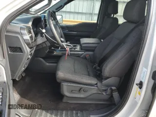 2023 Ford F-150 XL with VIN 1FTEW1CP4PKD26319, listed as a Copart auction lot 43797415 with 25,895 mi miles and Salvage Title. Bid and sale history available at DreamBid. Image 7.
