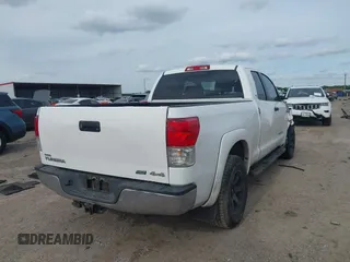2012 Toyota Tundra with VIN 5TFUW5F16CX225421, listed as a IAAI auction lot 42210783 with 207,025 mi miles and . Bid and sale history available at DreamBid. Image 4.