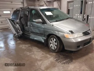 2002 Honda Odyssey EX z VIN 2HKRL18602H517284, wystawiony jako IAAI lot #41734297 z przebiegiem 230 833 mil mil oraz . Historia ofert i sprzedaży dostępna na DreamBid. Obrazek 1.