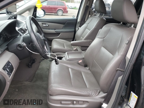 2015 Honda Odyssey Touring Elite with VIN 5FNRL5H91FB504095, listed as a Copart auction lot 53868125 with 176,272 mi miles and Salvage Title. Bid and sale history available at DreamBid. Image 7.