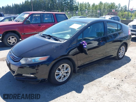 2010 Honda Insight EX with VIN JHMZE2H76AS043235, listed as a IAAI auction lot 42715178 with 156,073 mi miles and . Bid and sale history available at DreamBid. Image 2.