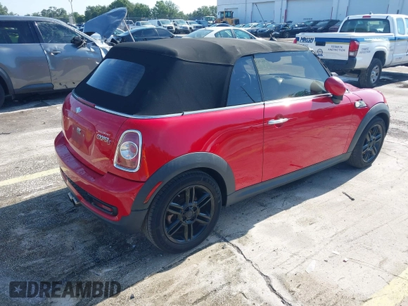 2014 MINI Convertible S с VIN WMWZP3C50ET298497, выставлен на аукционе IAAI как лот 42345812 с пробегом 119 921 миль миль и . История ставок и продаж доступна на DreamBid. Изображение 4.
