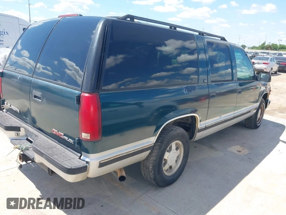 1995 GMC Suburban z VIN 1GKEC16KXSJ712111, wystawiony jako IAAI lot #42185423 z przebiegiem 269 010 mil mil oraz . Historia ofert i sprzedaży dostępna na DreamBid. Obrazek 4.
