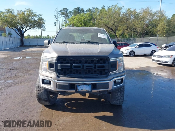 2018 Ford F-150 XL with VIN 1FTEW1EG1JFC31794, listed as a IAAI auction lot 41304111 with 129,058 mi miles and . Bid and sale history available at carsss.com. Image 12.