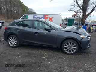 2017 Mazda 3 Touring with VIN 3MZBN1L7XHM135792, listed as a IAAI auction lot 41732569 with 81,368 mi miles and . Bid and sale history available at DreamBid. Image 14.