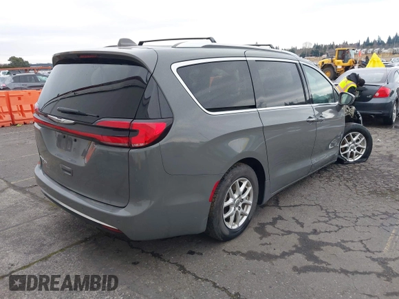 2021 Chrysler Pacifica Touring L with VIN 2C4RC1BG0MR543634, listed as a IAAI auction lot 41513467 with 148,010 mi miles and . Bid and sale history available at DreamBid. Image 4.